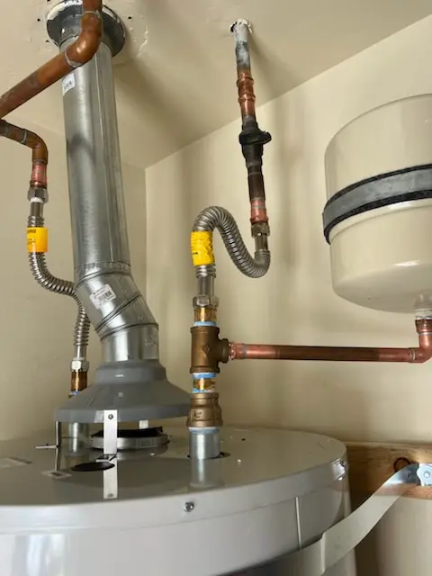 Water heater installation and plumbing repair in Whitney